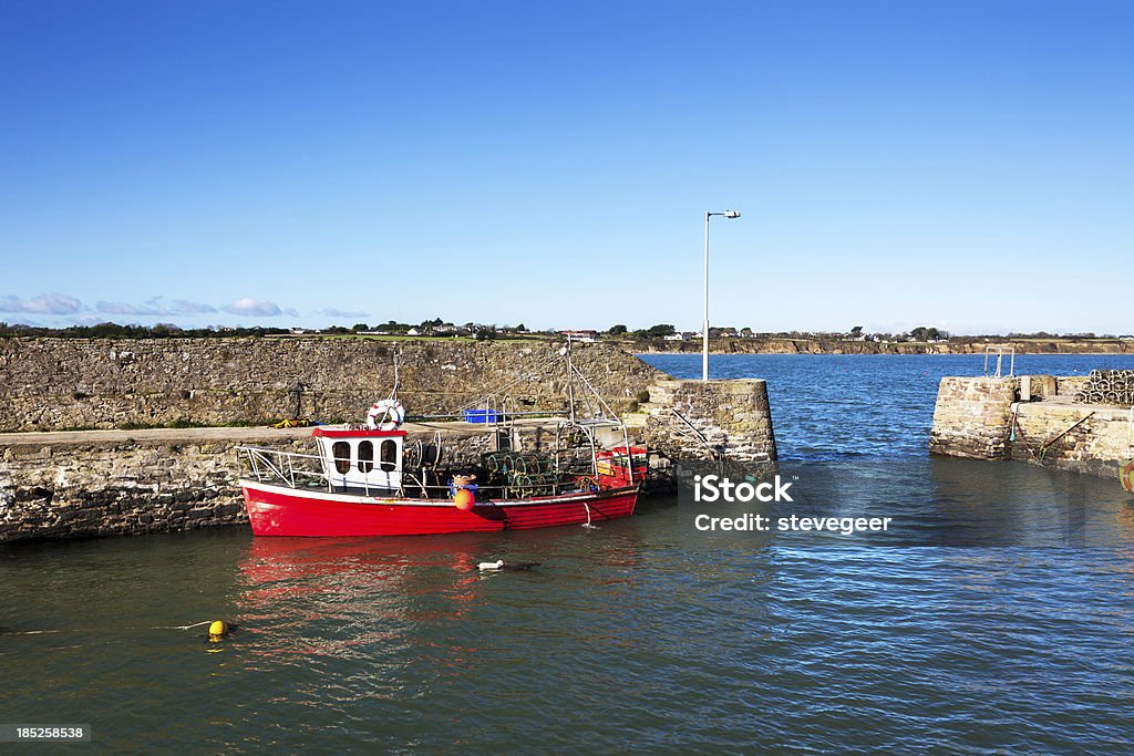 Red Fishing boat, Fethard Harbour, County Wexford, Ireland  Agriculture Stock Photo