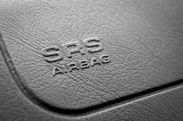 Embossed sign of car SRS airbag.