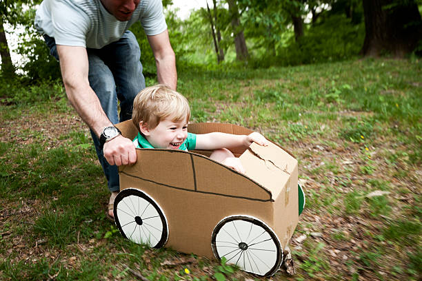 istock Little Boy in a Cardboard Car 185258732