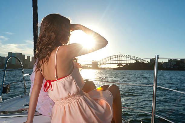 istock Woman viewing Sydney harbour bridge from boat 185260599