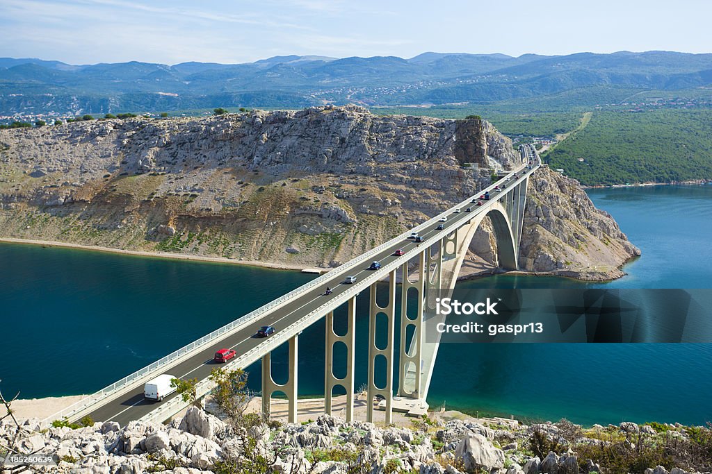 on the way to summer holidays arch road bridge connecting the island of krk and mainlandCHECK OTHER SIMILAR IMAGES IN MY PORTFOLIO.... Croatia Stock Photo