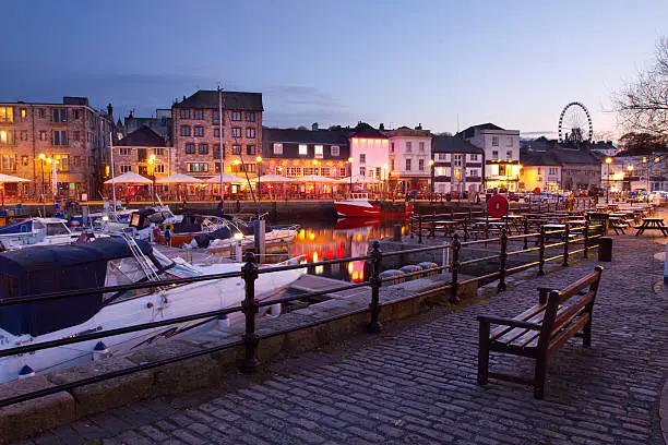 "A tranquil scene at Plymouth Barbican. Plymouth Barbican is a historic part of Plymouth full of bar, restaurants and clubs. A popular night spot for party goers.The photograph looks across the cobble street and harbour at twilight.More photographs from Plymouth in my portfolio here -"