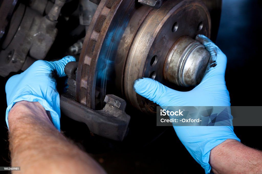 Auto réparation - Photo de Gants de protection libre de droits