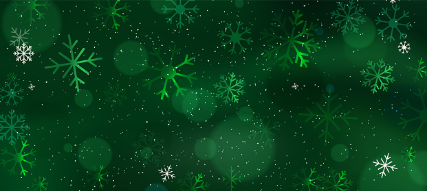 Dark green winter background with snowflakes and hanging balls decoration