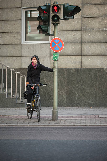 istock Woman Commuting at Red Light on her Bicycle 185261634