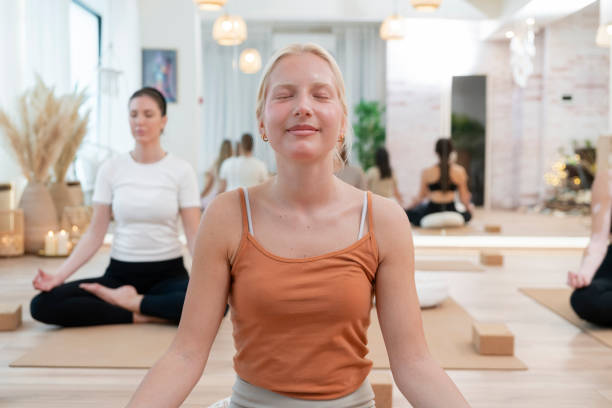 istock Group of women at yoga class 1852620139