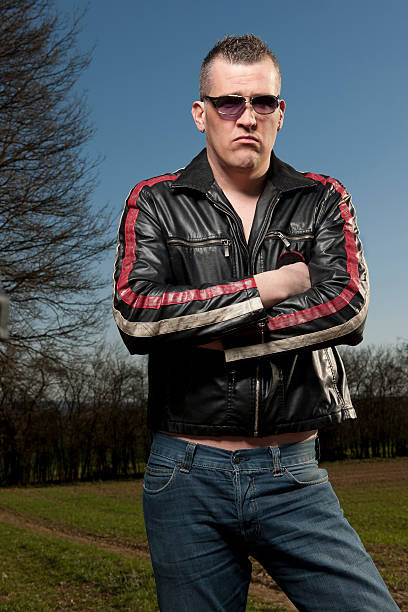 istock Man with leather jacket standing in field 185262572