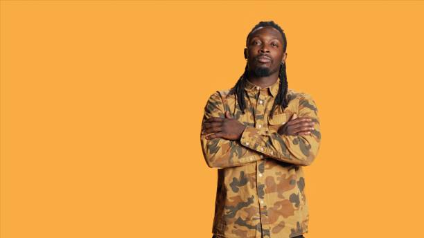 istock Portrait of guy with dreads smiling in studio set 1852625902