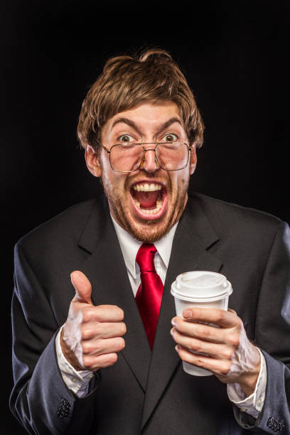 istock Comical Nerdy Businessman on Black Background, Thumbs Up 185262635