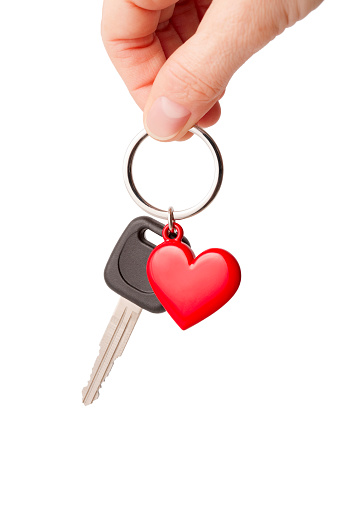 Car key with heart shaped key ring. Isolated on a pure white background, absolutely no dot in the white area no need to cut-out e.g. can be dropped directly on to a white web page seemlessly.