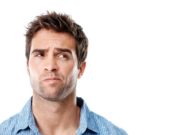 istock Handsome young man in striped shirt with a frown 185264102