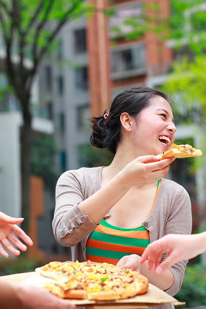 istock happy young woman with friends 185265697