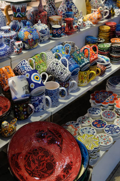 istock souvenir colorful mugs in the store 1852657409