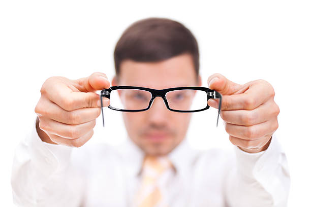 istock Business Man Holding Glasses 185265895