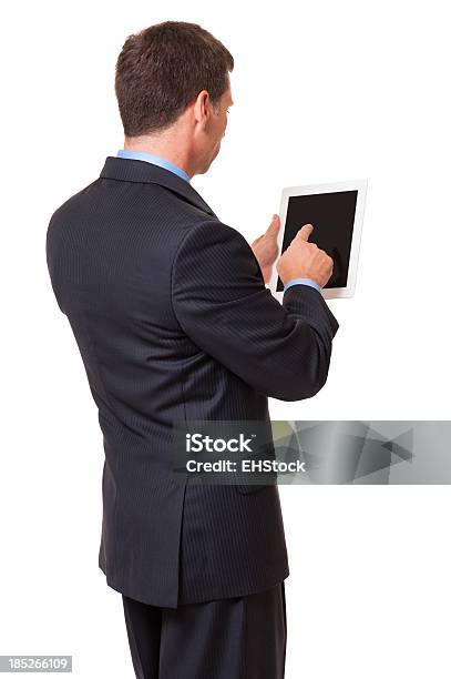 Foto de Homem Branco Emoldurado Tablet Em Um Fundo Branco e mais fotos de stock de Mesa digital - Mesa digital, Terno, Homens