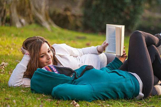 istock Girls Reading in the Park 185266127