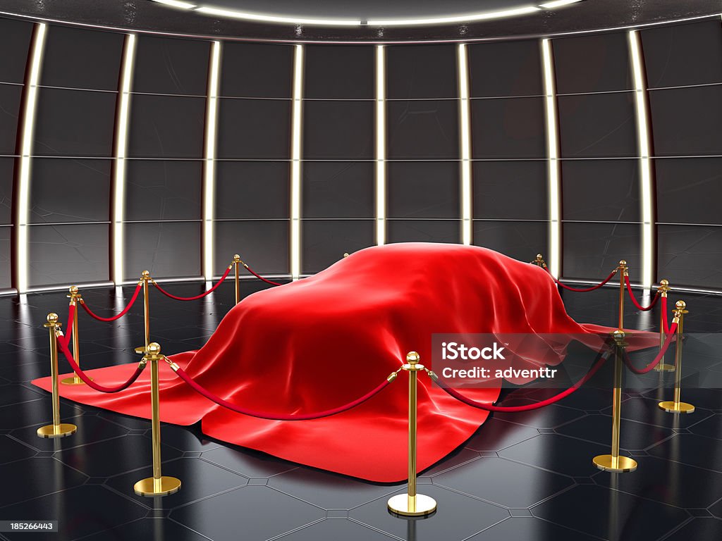 New car model exhibition New model covered with red velvet with stanchion ropes and pole barriers.Similar: Car Stock Photo