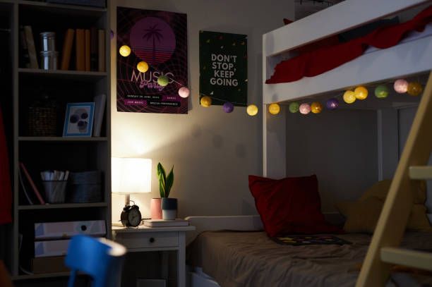 istock Cozy Teen Room with Bunk Bed and String Lights 1852667556