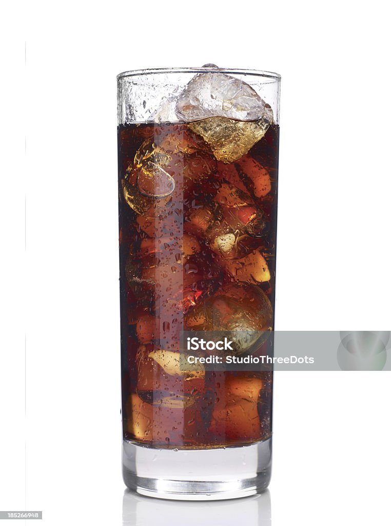 glass of cola with ice glass of cola with ice isolated on white background. Cola Stock Photo