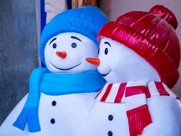 istock A snow man and a snow women statue 1852670695
