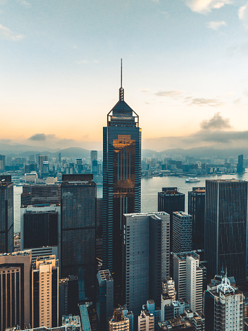 Hong Kong viewed from the drone with city skyline of crowded skyscrapers.