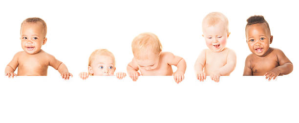 Baby Banner Cute babies having fun together. Looking down at your advertisement. Please checkout our other baby images which are totally interchangeable with these babies: group of babies stock pictures, royalty-free photos & images