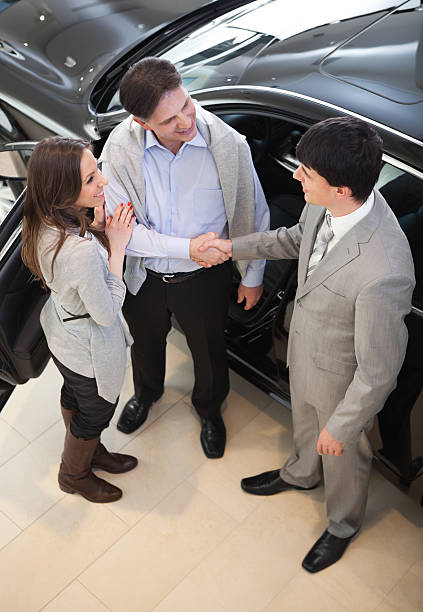 istock Couple buying car. 185267328