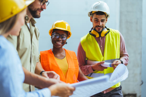 istock Diverse Team of Specialists Taking a Walk Through Construction Site. 1852673905
