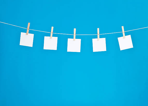 hanging blank note pads hanging blank note pads clothesline photos stock pictures, royalty-free photos & images