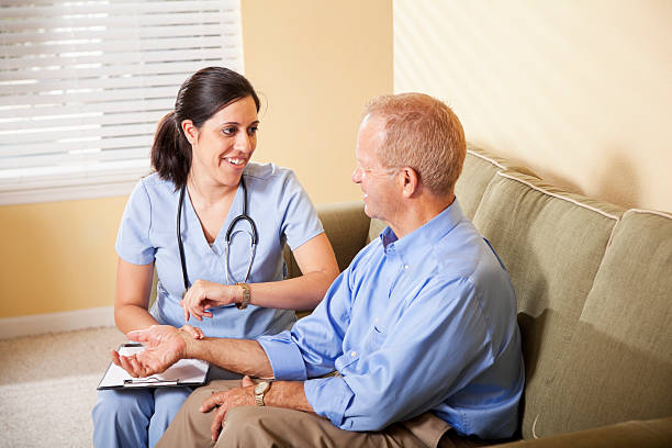 istock Healthcare worker checking patient's pulse 185267539