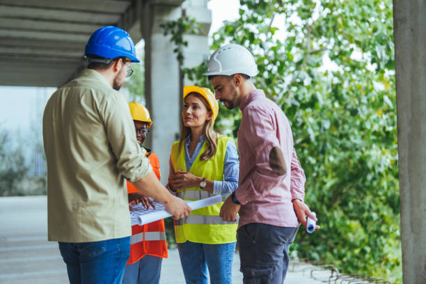 istock Diverse Team of Specialists Taking a Walk Through Construction Site. 1852678244