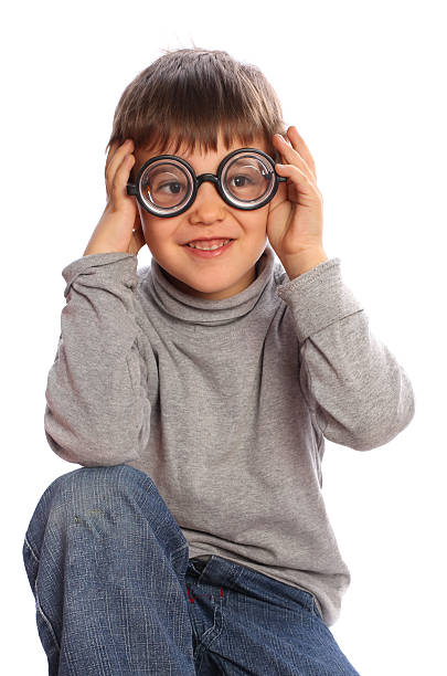 istock Smiling with funny glasses nerd boy 185268089