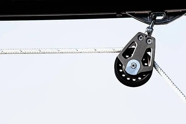 "modern boom rope pulley, isolated against skyCHECK OTHER SIMILAR IMAGES IN MY PORTFOLIO...."