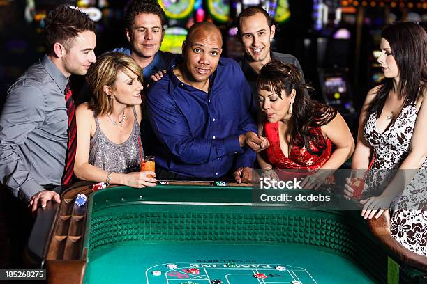 Diverse Group Of People Playing Craps In Casino Stock Photo - Download Image Now - Craps - Dice Game, Table, Casino