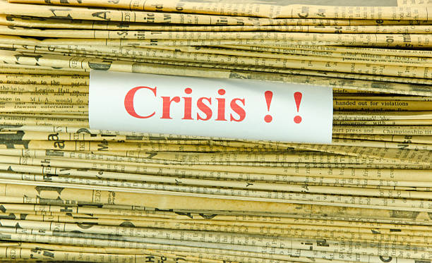 istock Stack of Yellowed Newspapers and Crisis 185268493