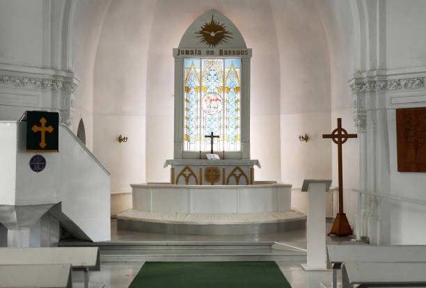 Church Interior in White with Stained Glass Window at Altar