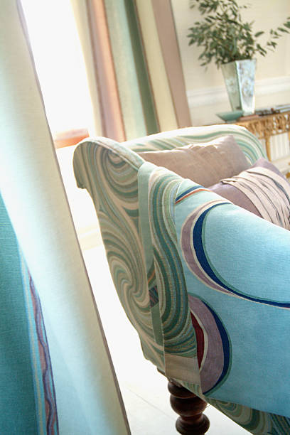 istock Close up of small formal sofa In Window with cushions 185268989