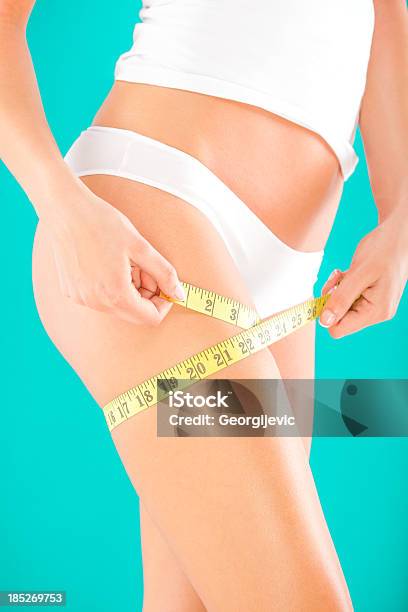 Slimming Woman Stock Photo - Download Image Now - Abdomen, Adult, Beautiful People