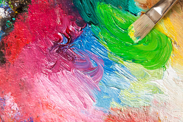 Paintbrush with oil paint on a classical palette Paintbrush with oil paint on a classical palette- OTHER artists materials related photos: oil paint palette stock pictures, royalty-free photos & images