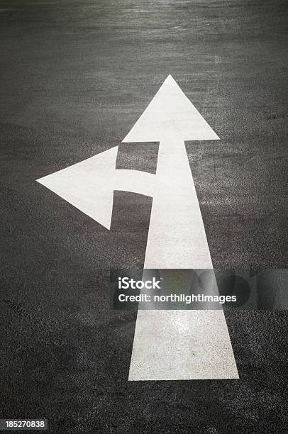 Arrow In Car Park Stock Photo - Download Image Now - Arrow Symbol, Asphalt, Black Color