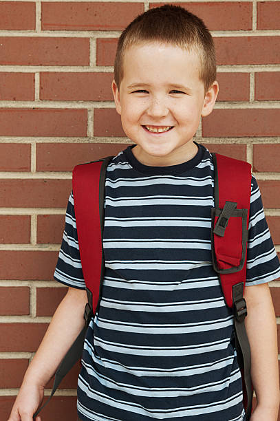 istock Happy school boy 185270869