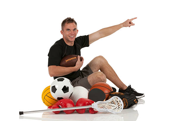 istock Man sitting with sports equipment 185271851
