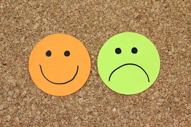 istock Papers with happy and sad faces 185271953