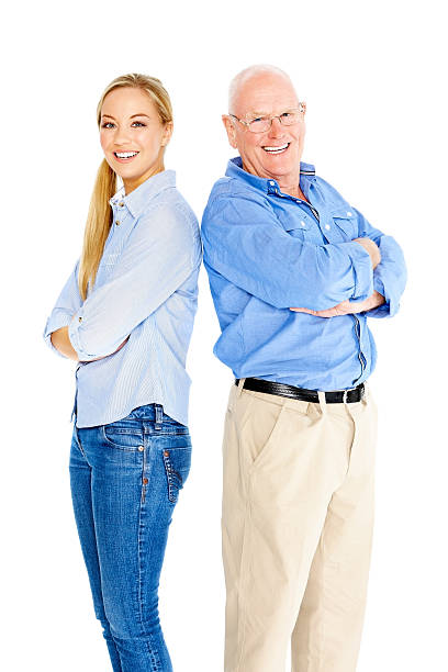 istock Father and daughter smiling against white 185271955