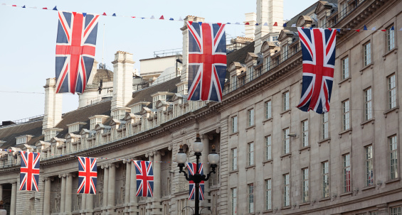 London, UK - 9 September, 2023: British flags above the Mayfair hotel entrance. Mayfair is one of the richest areas to live with fancy lifestyle