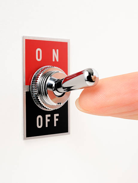 istock Isolated shot of ON/OFF switch with finger on white background 185272285
