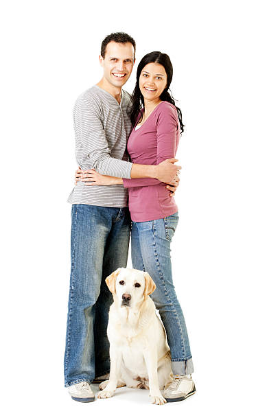 istock happy couple and dog 185272779