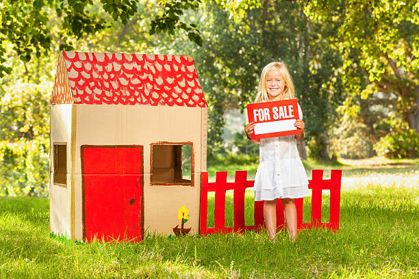 istock Girl Holding ~For Sale~ Sign 185272849