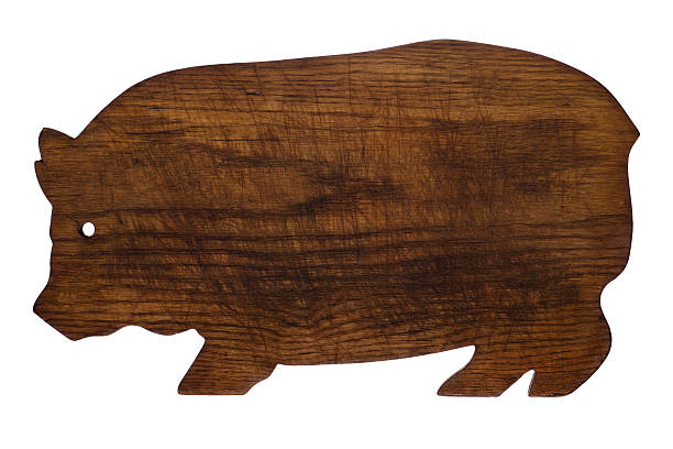 istock Wooden Antique Pig Shaped Cutting Board Isolated on White 185273257