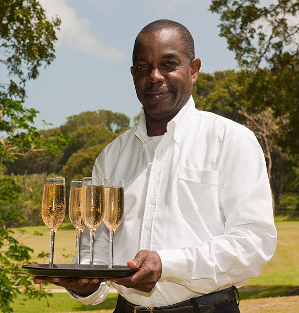 butler - waiter butler champagne tray fotografías e imágenes de stock